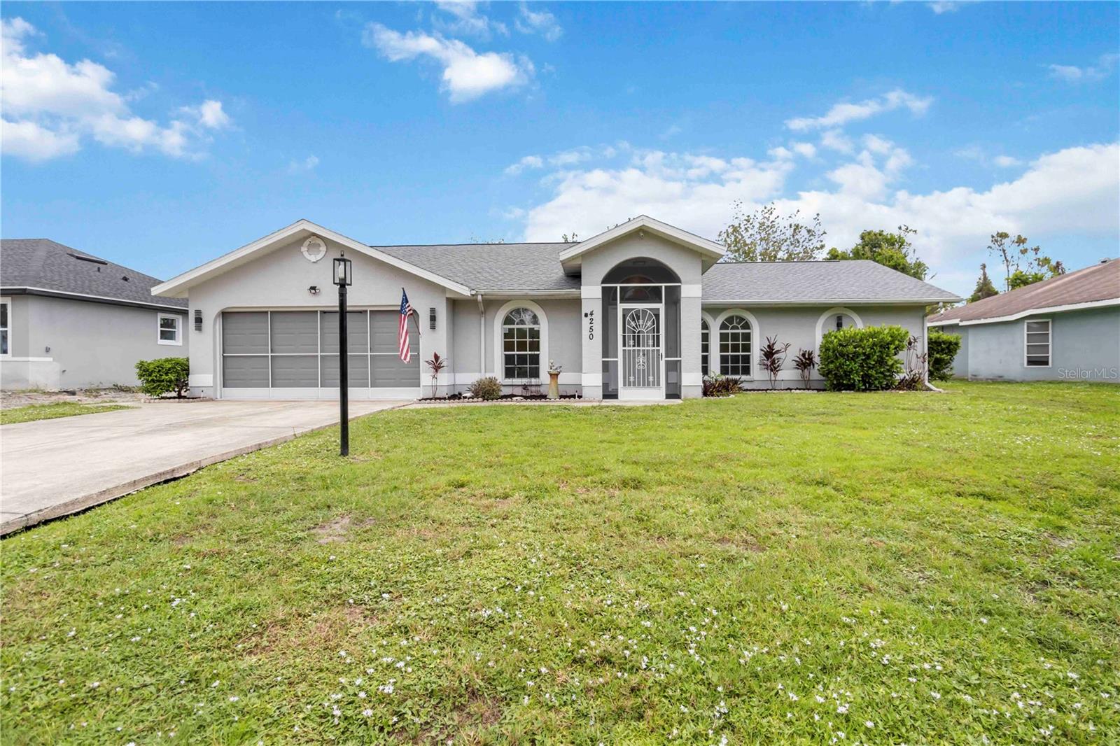 Completely Remodeled – Move-In Ready! Welcome to this stunning 3-bedroom, 2-bath home with a 2-car garage, fully remodeled in 2025 with top-to-bottom upgrades and modern, high-end finishes. Every detail has been thoughtfully designed to offer style, comfort, and peace of mind. Enjoy cooking and entertaining in the gorgeous kitchen, featuring quartz countertops, soft-close cabinetry, brand-new stainless steel appliances, and designer lighting. Both bathrooms have been upgraded to match, with quartz vanities, sleek tile, stylish fixtures, and touch screen mirrors for added convenience and flair. The home features ensuite baths in both the primary and guest suites, providing comfort and privacy for all. A pocket sliding door off the great room opens up the space for seamless indoor-outdoor living and entertaining. Throughout the home, you'll find luxury vinyl plank flooring, tile in the bathrooms, recessed lighting, and fresh interior paint. The textured ceilings, new interior doors, and custom blinds add to the home’s crisp, modern feel. New insulation enhances energy efficiency year-round. The home boasts a brand-new roof (2024), newer air conditioner, and water heater, giving you major system updates that are ready for years of worry-free living. The 2-car garage includes a drop sink and a freshly painted floor, adding convenience and utility. Located in a desirable area of North Port, this home is close to shopping, dining, and easy highway access. There is truly nothing left to do—just move in and enjoy. Come see this exceptional home today before it’s gone! Check out the video at https://www.youtube.com/watch?v=7n4skHl8O6U