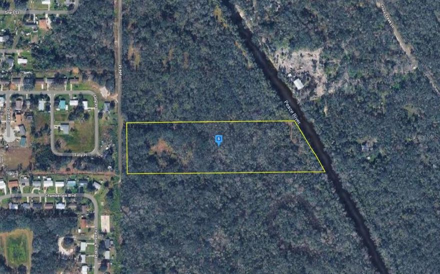 This 9.5-acre property offers an excellent opportunity to build your future home or enjoy a private recreational retreat, featuring approximately 380 feet of frontage along the Peace River. As you enter the property, a small pond and cleared area provide a great starting point for development. The land includes an artesian well and septic tank on site (per seller), along with a small concrete slab near the river, ideal for storage or a future shed. Enjoy a peaceful, natural setting with plenty of space for outdoor activities, including hunting and recreation. Whether you’re planning a custom build or a weekend getaway, this property offers the space, flexibility, and riverfront location to bring your vision to life. Listing is for land only and comes As Is.