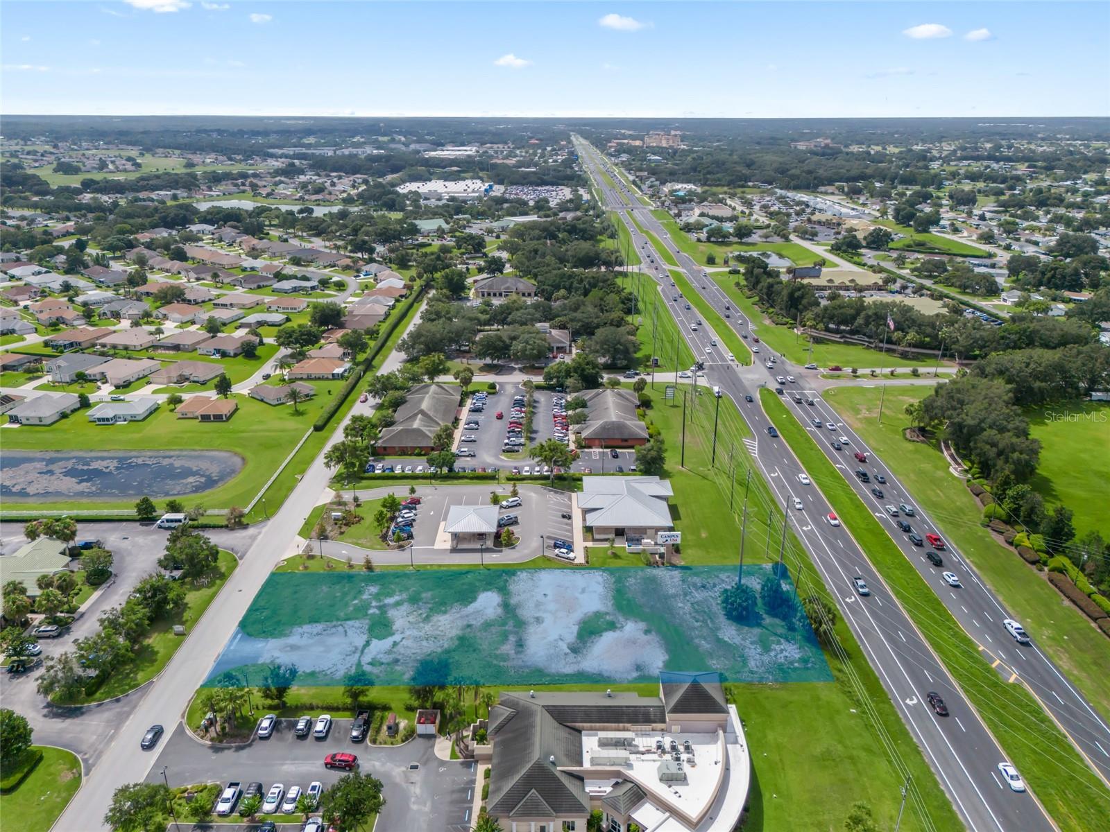 Hwy. 441/27 FRONTAGE Outparcel 1.12 acre shovel ready site, zoned PUD Marion County with B2 uses. RETAIL/MEDICAL/OFFICE. GOLF CART accessible to Stonecrest, The Villages, Spruce Creek and all conveniences. Water & Sewer to site, property is cleared, filled to grade with off site stormwater ponds. outstanding restaurants and every convenience make this area most popular! Neighboring retail includes, Floor & Décor, Super Walmart, Publix, Lowes, McDonalds, Beall’s, Aldi, Truist. 1.3 miles from UF Health Hospital.
