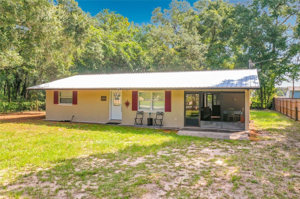 Photo of 5891 SE 171st Court, Ocklawaha, FL 32179 (MLS # G5118030)