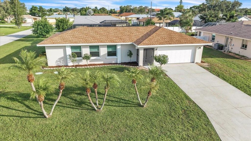 Photo of 907 Sidney Terrace NW, Port Charlotte, FL 33948 (MLS # C7515126)