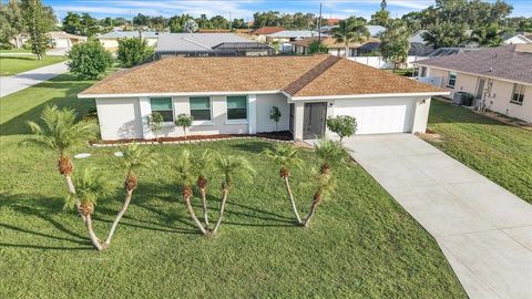 Photo of 907 Sidney Terrace NW, Port Charlotte, FL 33948 (MLS # C7515126)