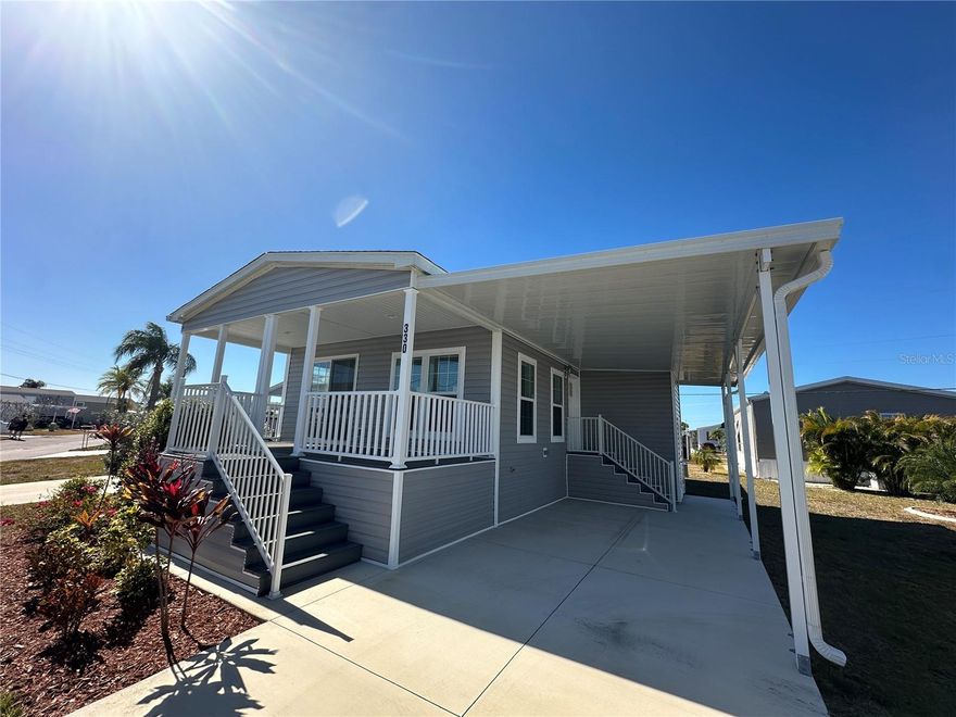 Brand new 2-bedroom, 2-bath double-wide manufactured home located in the desirable 55+ community of Harbor Cove in North Port, Florida. Thoughtfully built with 2x6 exterior walls for added strength and energy efficiency, this home features a bright, modern interior with drywall throughout and a tray ceiling that enhances the open living area. The kitchen is both stylish and functional, offering a tile backsplash, stainless steel farmhouse sink, and contemporary finishes ideal for everyday living or entertaining. Designed with comfort and efficiency in mind, this home is Energy Star certified, helping to keep utility costs low year-round. Enjoy easy Florida living in a friendly, well-maintained community conveniently located near shopping, dining, medical facilities, and Gulf beaches. A perfect opportunity to enjoy low-maintenance living in a brand-new home—move in and enjoy!