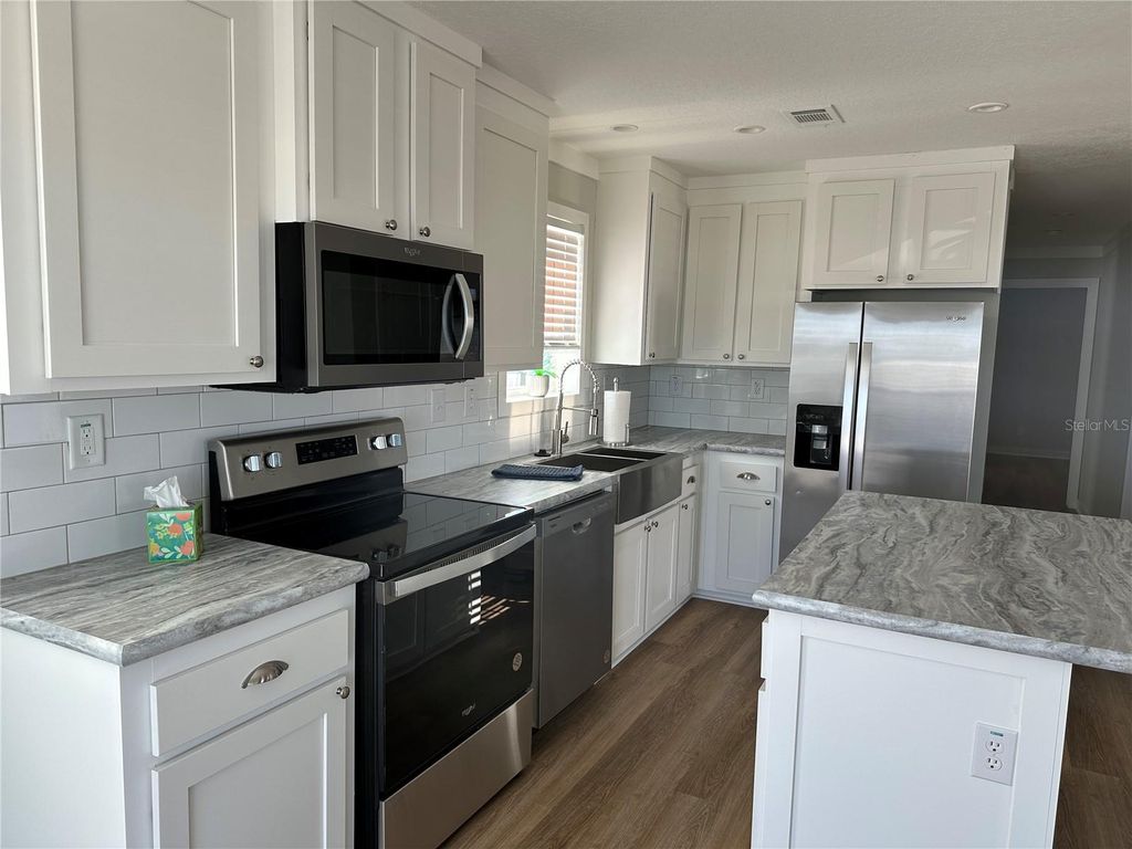 Photo of 330 Trailorama Drive, North Port, FL 34287 (MLS # N6142909)