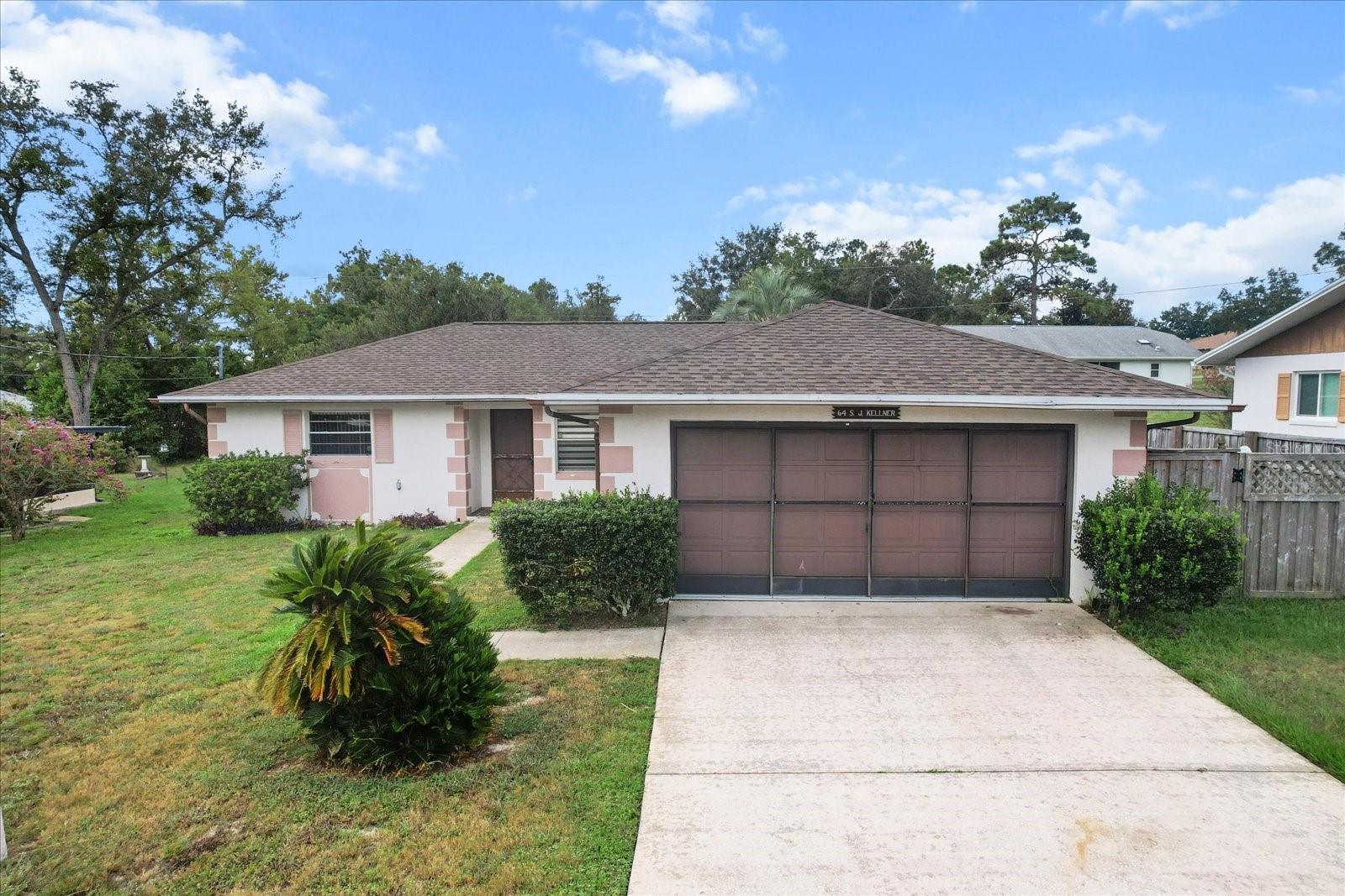 Charming 2 bedroom, 2 bath pool home with a 2-car attached garage and a brand new roof. This home features an open floor plan with combined living and dining areas that flow into the galley-style kitchen. A split bedroom layout provides added privacy, and there's an additional office or flex space for work or hobbies.
The sunroom off the kitchen and dining area opens to a screened-in lanai and sparkling pool, perfect for relaxing or entertaining. Wood-look tile flooring runs throughout the home. The primary bedroom includes an ensuite bath. Fully fenced backyard offers space for pets or outdoor enjoyment. Great layout with potential to make it your own.