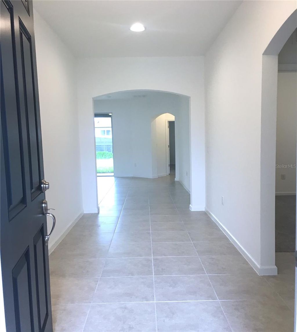 Photo of 129 Bella Verano Way, Davenport, FL 33897 (MLS # O6408444)