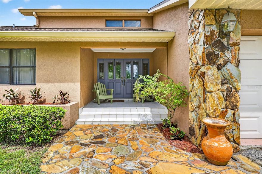 Set on more than 3 acres—including a dividable 1.5-acre lot—this 5-bedroom, 3-bath pool home offers character, space, and endless possibilities.
Step into the formal living and dining rooms, where vaulted ceilings and sweeping views of the pool and patio create a welcoming first impression.
The open kitchen features a breakfast nook, floor-to-ceiling pantry space, and overlooks a spacious family room complete with a built-in entertainment bar, a custom fireplace, and unique built-in shelving. Wall-to-wall sliders open to the pool patio, making this the perfect backdrop for family gatherings and entertaining.
The split floor plan provides privacy, with two bedrooms on the west side of the home, including a large primary suite with pool access and an expansive en suite bath. The second bedroom, outfitted with wall-to-wall built-ins, doubles beautifully as a home office.
On the east side of the home, just off the kitchen, are two additional bedrooms and a private bath.
One bedroom offering almost 400 ft.² with a private entrance makes it perfect for an in law suite or hosting out-of-town guests.At the back of the home, you’ll find a versatile bonus room—ideal for a playroom or second office—along with a 5th bedroom and a third full bedroom with pool access.

Recent updates include a resurfaced pool (within the last 3 years), two AC units (2015 & 2017), and a new water heater (2024)
Outdoors, the property is truly unique, featuring horse stables and even a full baseball diamond—an incredible space for your little league teammates to gather and play.
With over 3 acres to enjoy—and the potential to divide—the opportunities for growth and lifestyle are limitless. 
Locally grown produce, Family operated restaurants, Antique shops and good old-fashioned country living, make this one of the most desirable locations in the area.
All, just 20–30 minutes from Downtown Tampa, with convenient access to I-4 and I-75 and  “A-rated” Strawberry Crest IB World High school.