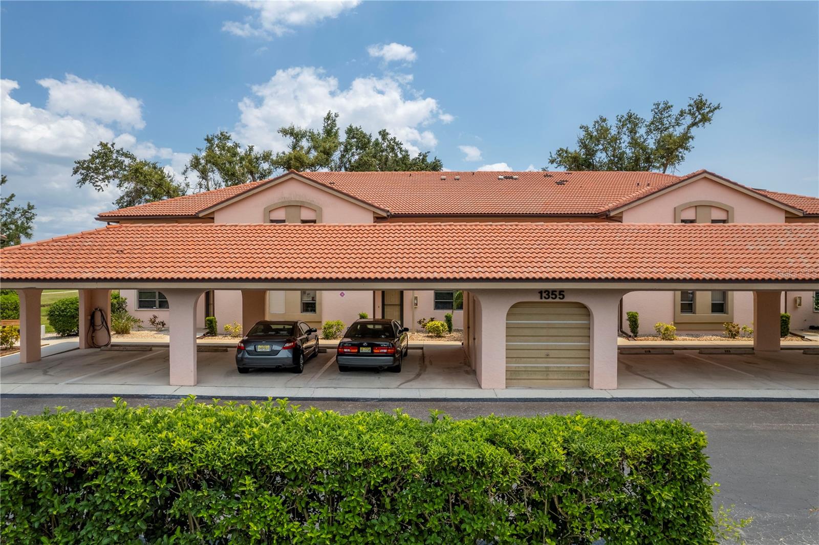 If you are looking for a peaceful, ambient setting, this first floor two bedroom condominium overlooking intersecting lake and fairway vistas of the Deep Creek Golf course is that rare opportunity waiting for you. Upon entry you are captivated by the tasteful updates that abound and the panoramic golf course views beyond. The kitchen features rich caramel color wood cabinetry with European influenced hardware that is complimented with stainless steel appliances, beautiful granite counters and slate color tile backsplashes. Decorative and under mounted lighting highlights the beauty of this very functional kitchen area. The breakfast bar area, perfect for staging your culinary treats when entertaining, is enhanced with picture mold Wainscote inset paneling, just another of the many subtle details found throughout the condo. Cream color tile flooring with caramel accents enhance the living room area that opens to a covered screened in lanai area with storage closet. Crown molding found in the living room and bedrooms suites is just one of the subtle details that add to the refinement of this property. The master bedroom suite features hand scraped engineered hardwood hickory flooring, offering a beautiful transition from the tile flooring found in the living room and kitchen areas. The master bath with its dual sinks, features the rich cabinetry with European influenced hardware and granite counters featured in the kitchen. Beautiful tiled walls extended from the master shower, is just another uniquely impressive enhancement to the master bath area. The guest bedroom suite features light caramel color engineered wood flooring with crown molding and captures an abundance of natural light. Well thought details weren’t overlooked in the guest bath with its furniture styled vanity and granite counter. In addition to the many features this property offers is hurricane protection found in the roll down shutters in the lanai area. Enjoy an early morning swim in the community pool or perhaps a round of golf at the family friendly Deep Creek Golf Course. Located within 15 minutes from Punta Gorda’s historic downtown and its waterfront shops and restaurants and the famed Fisherman’s Village, what more could you ask for? Literally in move in condition with a host of impressively tasteful updates not commonly found, not to mention the breathtaking golf course vistas, there is no better way to enjoy all the Florida lifestyle has to offer at a very affordable price.