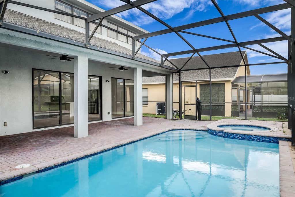 Photo of 563 Lake Davenport Circle, Davenport, FL 33837 (MLS # O6425534)