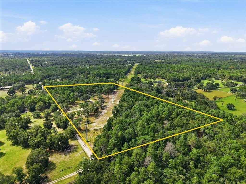 Photo of 10149 Rockbay Road, Brooksville, FL 34601 (MLS # TB8554977)