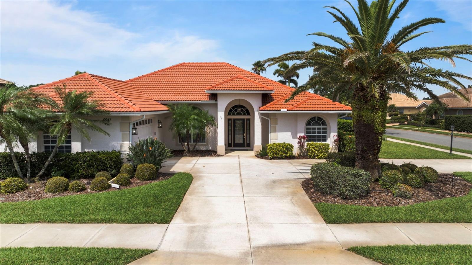 Welcome to 4641 Gaeta Dr, a thoughtfully designed and meticulously cared-for TURNKEY residence located in the gated community of Venetia in Venice, Florida. Set on a beautifully landscaped corner lot, this spacious home offers over 2,600 square feet of living space with 3 bedrooms, 3 full bathrooms, and a flexible den that can easily be converted into a 4th bedroom—perfect for guests, a home office, or a creative space. The 2023 ROOF replacement offers peace of mind for years providing long-term protection, reduced risk of costly repairs, and ease of obtaining insurance.
From the moment you arrive, you’ll appreciate the circular driveway, oversized garage, and mature landscaping that provide both curb appeal and functionality. Inside, the home features high ceilings, crown molding, dual living areas, and new lighting fixtures, creating a bright and elegant atmosphere throughout. Offered furnished, the home is truly move-in ready—ideal for seasonal or full-time living.
The open floor plan flows seamlessly to the outdoor space, where a private pool with a tranquil water feature invites you to relax or entertain in style. A new tile roof adds value and peace of mind, while the soaking tub in the primary suite provides the perfect end to your day.
Ideally located just under 5 miles from Wellen Park, you’ll enjoy access to the Atlanta Braves’ spring training stadium, a vibrant town center with award-winning dining, boutique shopping, live entertainment, and Florida’s top-rated farmers market. Historic Downtown Venice, only 6 miles away, offers timeless charm with local cafes, cultural attractions, and beautiful architecture. And when it’s time for sun and surf, Venice Beach is just 6.5 miles from your doorstep.
With its generous layout, desirable upgrades, prime location, and furnished convenience, this original-owner home offers the perfect opportunity to enjoy the best of Florida living—whether you're looking for a seasonal retreat or your forever home.