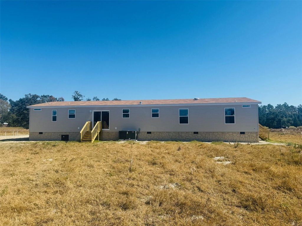 Photo of 11822 153rd Road, Live Oak, FL 32060 (MLS # W7882850)