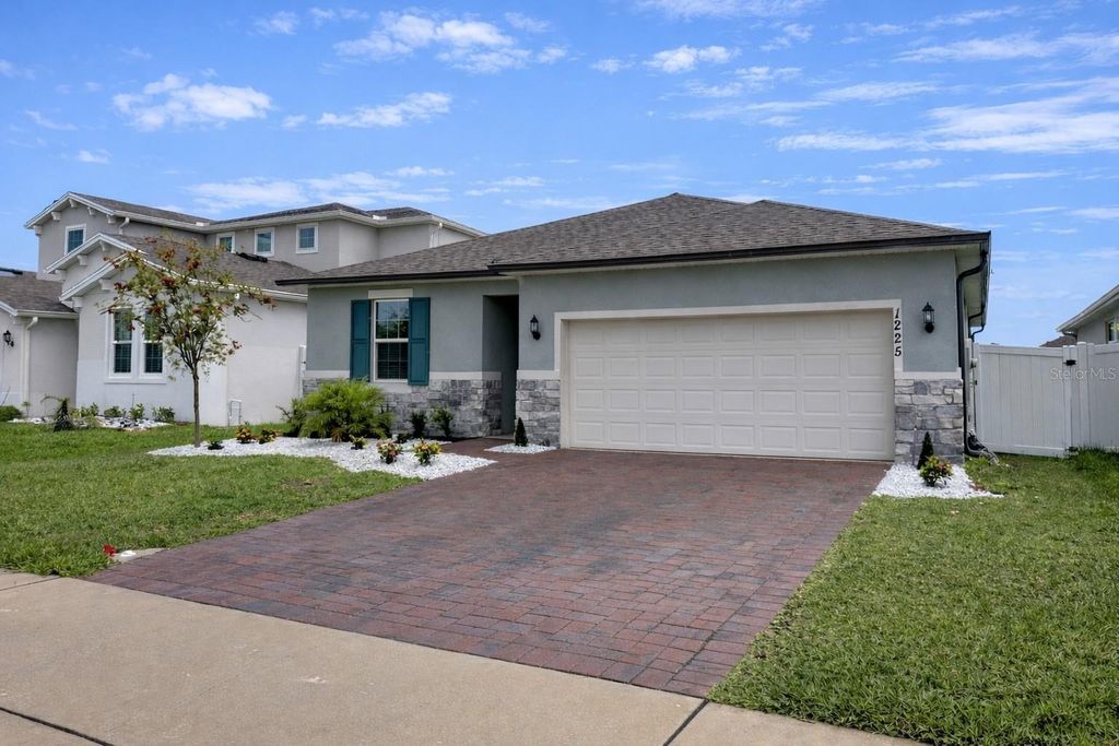 Photo of 1225 Fox Hedge Lane, Saint Cloud, FL 34771 (MLS # O6403965)