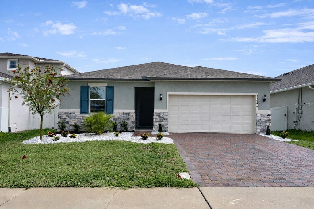 Photo of 1225 Fox Hedge Lane, Saint Cloud, FL 34771 (MLS # O6403965)