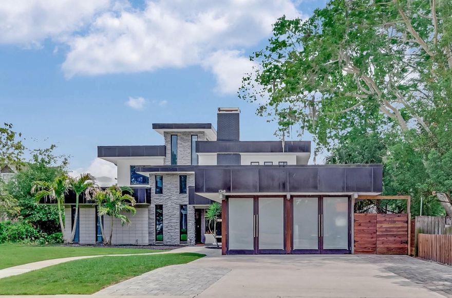Welcome to this stunning contemporary home on a brick-lined, tree street in the heart of Winter Park. Boasting a seamless blend of timeless charm and modern luxury, this 1963 home was fully remodeled in 2018. This residence showcases impeccable craftsmanship and thoughtful design, ensuring a comfortable and stylish living experience. Upon entering, you'll be greeted by an inviting foyer that leads you into the heart of the home. The main level features an open-concept layout, allowing for effortless flow and an abundance of natural light. The spacious living area is perfect for entertaining guests or relaxing with loved ones. The kitchen exudes modern sophistication with its sleek cabinetry, high-end appliances and exquisite countertops, and offers plenty of dining space for hosting friends and family. The first floor has three bedrooms and 3.5 baths, and extra space that could be an additional bedroom or office space. A highlight of this property is the addition of a second floor completed during the 2018 remodel. Here, you'll find a luxurious primary suite that serves as a private oasis. The main bedroom offers a tranquil retreat, featuring generous proportions and ample closet space. The accompanying main bath is a spa-like sanctuary, complete with a walk-in shower and contemporary fixtures, providing the ultimate in relaxation and comfort. The second floor also offers an additional bedroom with its own private bath and a flexible space that could be another bedroom, media room or additional office. Throughout the home, attention to detail is evident in the choice of finishes and fixtures, which perfectly complement the contemporary style. From the sleek flooring to the designer lighting, every aspect has been carefully selected to create a cohesive and visually striking environment. The outdoor spaces are equally impressive, with a professionally landscaped yard and a spacious patio area. Whether you prefer to unwind in the privacy of your own backyard or host gatherings for friends and family, this property offers the ideal setting. Located in a wonderful neighborhood, this home is conveniently situated near top-rated schools, Park Avenue shopping and dining, and the Winter Park Racquet Club and Interlachen Country Club. With its ideal blend of classic charm and modern updates, this fully remodeled residence is a rare find, offering an exceptional opportunity for those seeking a contemporary lifestyle in a sought-after location.