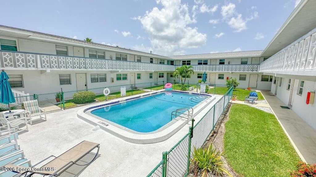 Photo of 8521 Canaveral Boulevard #6, Cape Canaveral, FL 32920 (MLS # O6439225)