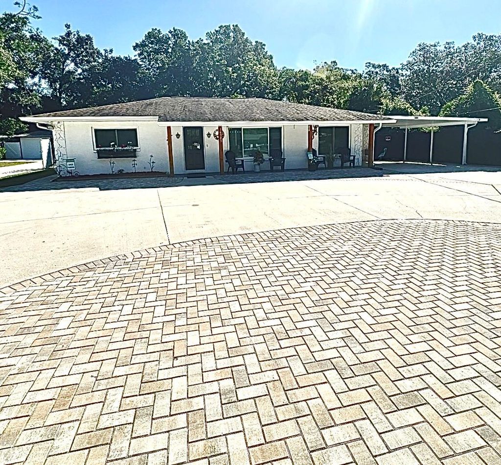 Photo of 16903 Hanna Rd, Lutz, FL 33549 (MLS # TB8438949)