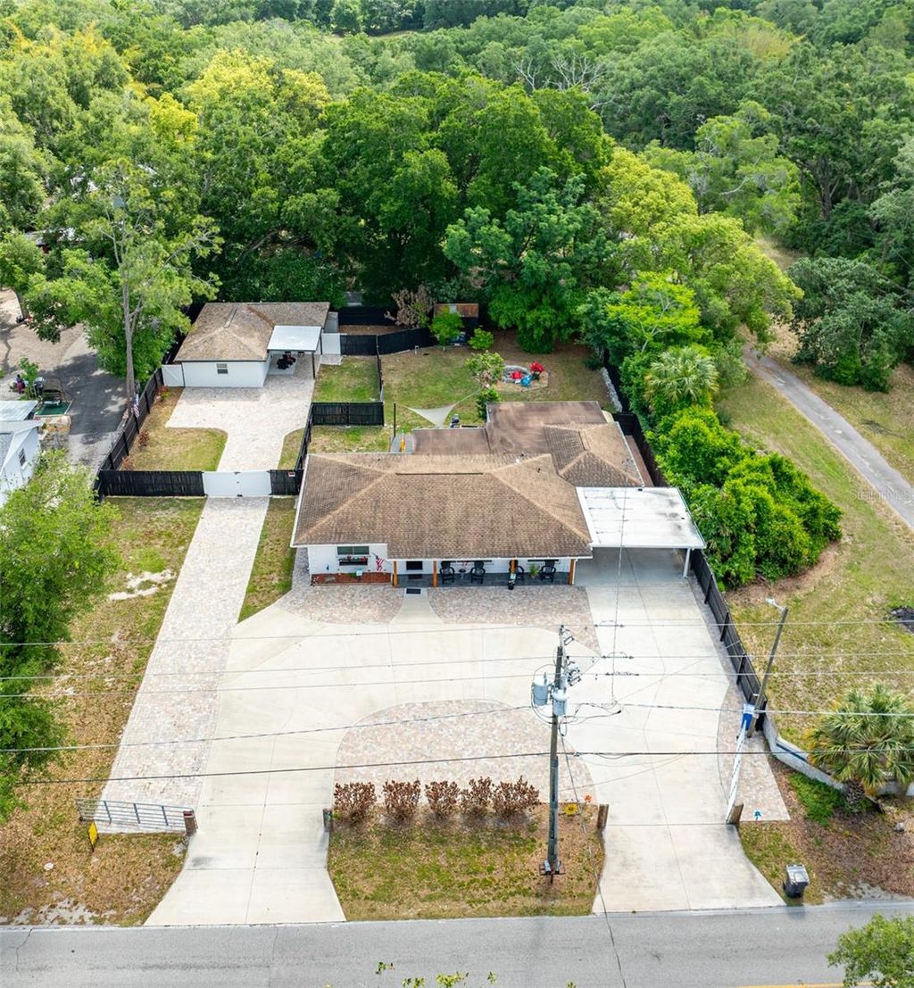 Photo of 16903 Hanna Rd, Lutz, FL 33549 (MLS # TB8438949)