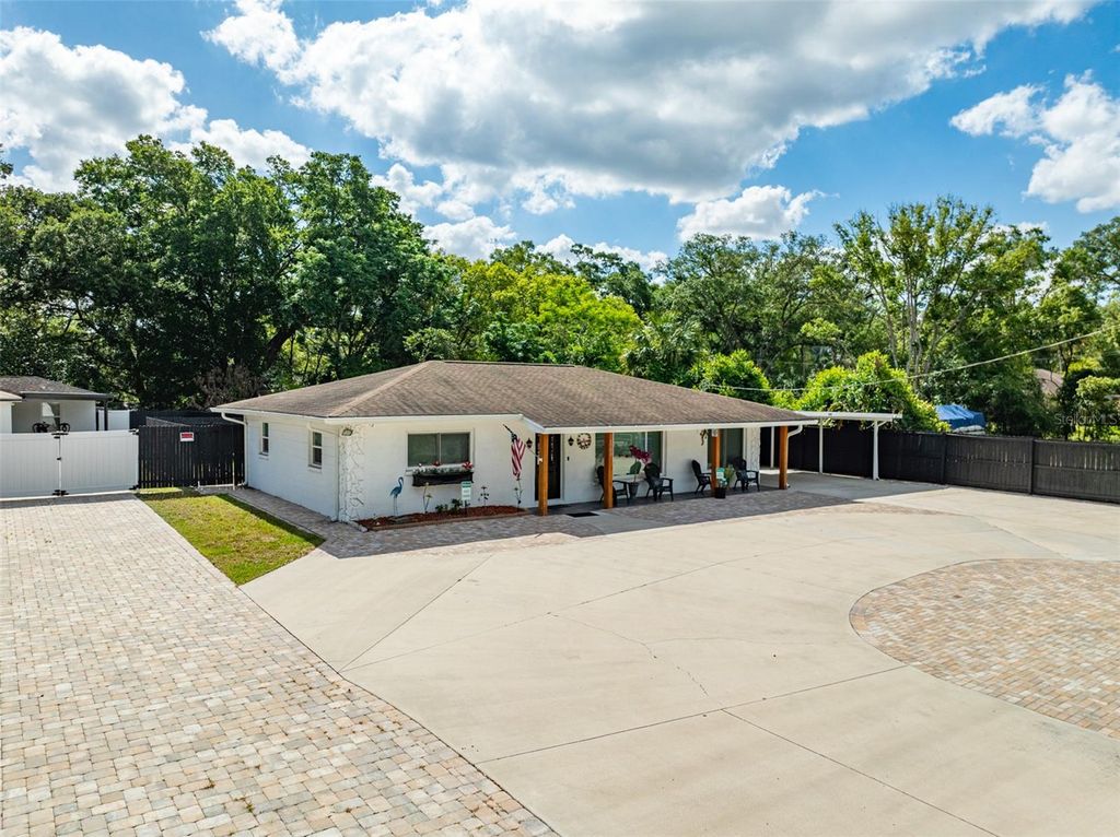 Photo of 16903 Hanna Rd, Lutz, FL 33549 (MLS # TB8438949)