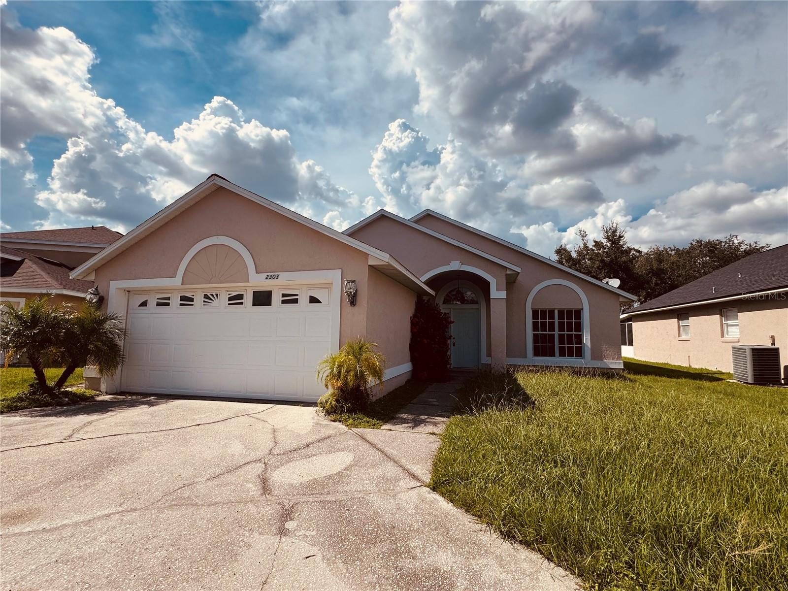 This 3-bedroom, 2-bathroom home Lakeside Community offers comfort, privacy, and convenience all in one. Featuring full ceramic tile flooring throughout, the home is both stylish and easy to maintain. With no rear neighbors, you’ll enjoy peaceful surroundings and extra privacy perfect for relaxing or entertaining. One of the standout features is the extended driveway, spacious enough to accommodate up to 4 cars, making parking easy for family and guests alike. Located just minutes from schools, major roads, shopping, and dining, this home is ideal for families or anyone seeking a welcoming community with everything nearby. Currently being updated with fresh finishes, and new photos will be available soon stay tuned for the full reveal! Don’t miss your chance to rent this charming home in one of Kissimmee’s most convenient and desirable locations.
