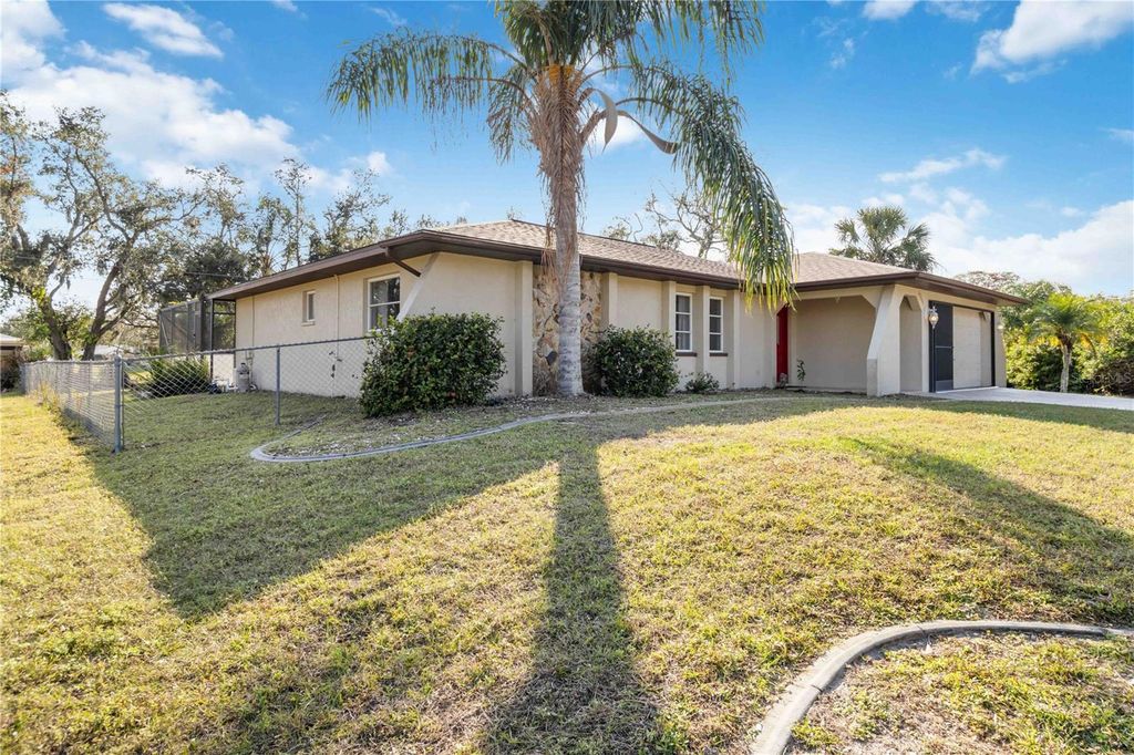 Photo of 22285 Walton Avenue, Port Charlotte, FL 33952 (MLS # OM719642)