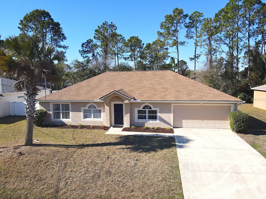 Photo of 48 Pennsylvania Lane, Palm Coast, FL 32164 (MLS # FC316408)