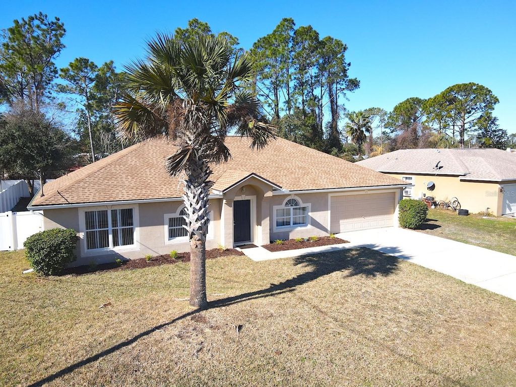 Photo of 48 Pennsylvania Lane, Palm Coast, FL 32164 (MLS # FC316408)