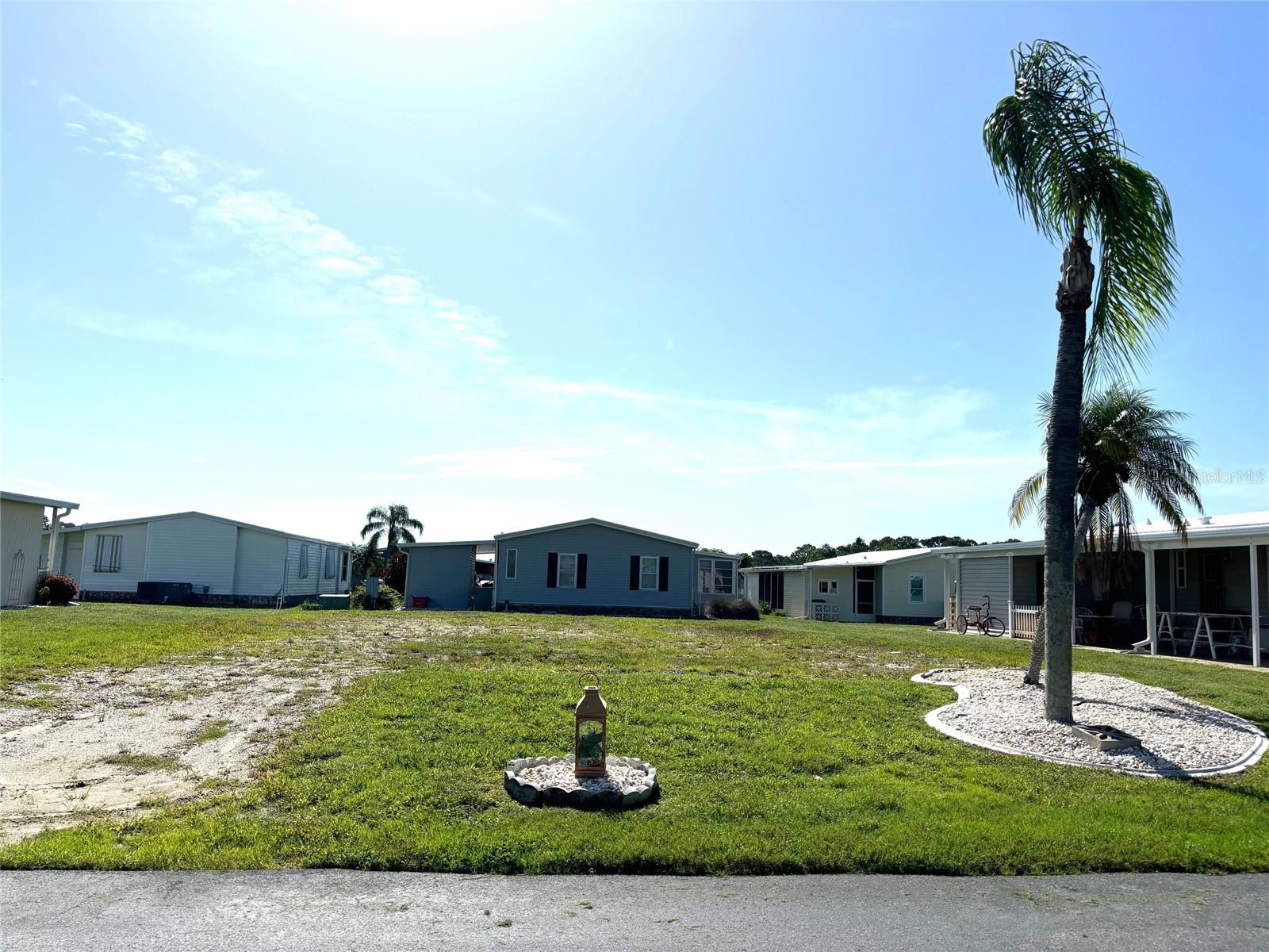 Vacant lot in a vibrant 55+ community! La Casa offers the ultimate Florida lifestyle. We have 974 homes nestled among a variety of native trees with spacious common grounds surrounding our eight lakes. Located between Sarasota and Fort Myers, this is a boater's dream with access to the Gulf of Mexico. It is convenient for shopping, sightseeing, golfing, fishing, and boating, as well as all the culture and elegance the Southwest Florida area is noted for. La Casa may have the best pools in the area. Our crown jewel is an extremely large, 40 X 60-foot swimming pool that is kept at a perfect 87 degrees. Our smaller 20 x 40 pool is quietly nestled between the clubhouse and the Activity Building. Both pools have adjacent hot tubs which are ideal for soaking muscles that are tired from golfing or tennis. Wireless Internet (Wi-Fi) is available at the Clubhouse, Activity Building, and Recreation Hall area where these pools & spas are located, so you can catch some rays while you catch up on your email! Sound enticing? Come for a visit to this self-contained oasis and see for yourself why La Casa is the ultimate destination for both snowbirds and year-round residents!