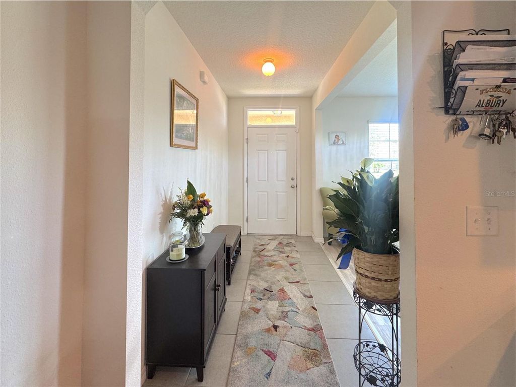 Photo of 9521 Sunstone Boulevard, Thonotosassa, FL 33592 (MLS # TB8406037)