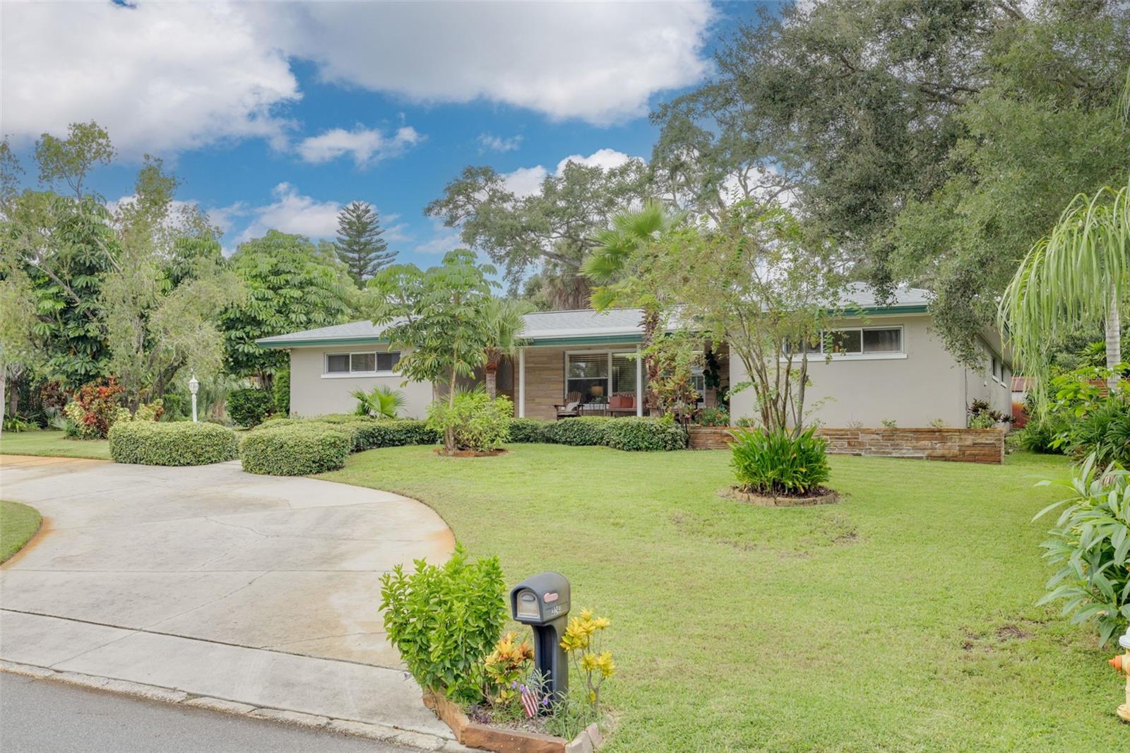 Situated in the desirable Del Oro Groves neighborhood, this 4-bedroom, 3-bathroom home offers spacious living throughout. Inside, you’ll find a split floor plan with 3 large guest bedrooms and a private primary suite. Step outside to the screened-in pool and lanai, recently resurfaced with a PebbleTec finish, featuring a built-in bar, sink, and BBQ/cooking area with chimney—perfect for entertaining. Additional updates include a brand-new roof in 2024, one of two water heaters was just replaced, and a freshly painted exterior. The property also offers a covered front porch with stone pavers, a circular driveway with side entry to the garage, and a large fenced corner lot with dedicated parking for an RV or boat. The oversized 2+ car garage provides ample storage and a built-in workbench, while the laundry room is conveniently located between the garage and kitchen. A lawn well and pump irrigation system with access to reclaimed water keep the landscaping lush, while removable hurricane shutters and a portable generator provide peace of mind. Located across from Cooper’s Bayou Park, residents can enjoy fishing, trails, an exercise course, and a launch for kayaks or canoes. The newly redesigned Del Oro Park offers pickleball courts, a playground, and basketball courts, while the Ream Wilson Trail invites outdoor enthusiasts to explore scenic routes leading to Safety Harbor or Tampa via the Courtney Campbell Causeway. Take your golf cart to downtown Safety Harbor and enjoy Main Street dining, boutique shopping, breweries, museums, live music, and year-round festivals, including the Third Friday Street Festival and Sunday Farmers Market. The Safety Harbor Marina and world-renowned Safety Harbor Resort and Spa are just minutes away. Best of all, this home is not in a required flood insurance zone! Don’t miss the opportunity to live in one of the area’s most sought-after communities.