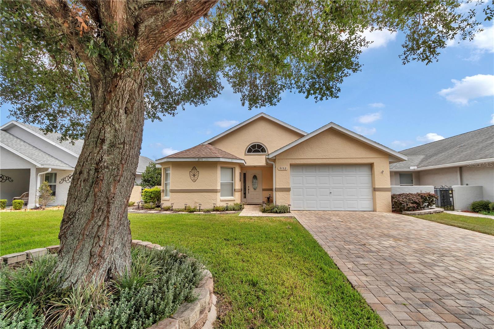 Well-Maintained 3/2 Patio Home in On Top of the World? 55+ Gated Golf Community
Welcome to this beautifully maintained 3-bedroom, 2-bath patio home offering 1,345 sq ft of comfortable living space in the desirable Williamsburg neighborhood of On Top of the World, a premier 55+ gated golf community.
This split-bedroom floor plan ensures privacy for both owners and guests. The spacious primary suite features an en-suite bath
with a large vanity, walk-in closet, and elegant Italian tile. Luxury vinyl flooring runs throughout the living room, kitchen, and primary bedroom for a clean, modern feel.
The upgraded kitchen boasts soft-close cabinets, durable Formica countertops, and offers both an eat-in space and a separate dining room for flexibility. A 1.5-car garage provides ample space for parking and storage.
Enjoy outdoor living year-round in the oversized screened lanai (added in 201) complete with a ceiling fan. Recent upgrades include a 2022 heat pump, ensuring peace of mind.