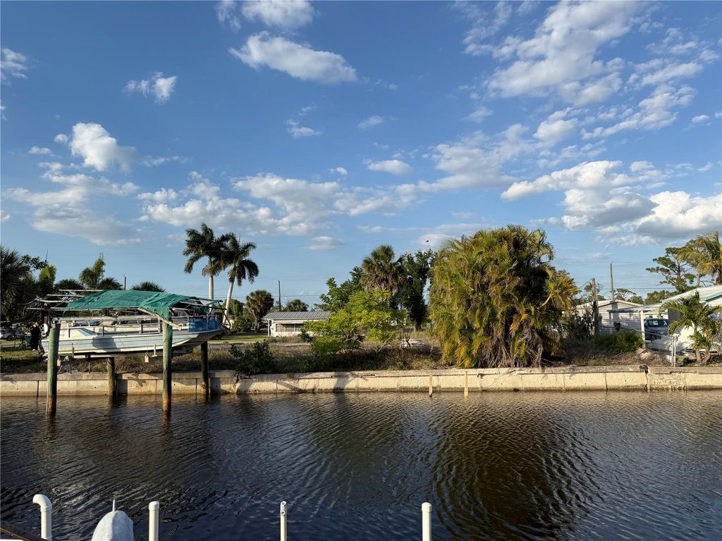 Photo of 4153 Hollis Avenue, Port Charlotte, FL 33953 (MLS # C7525434)