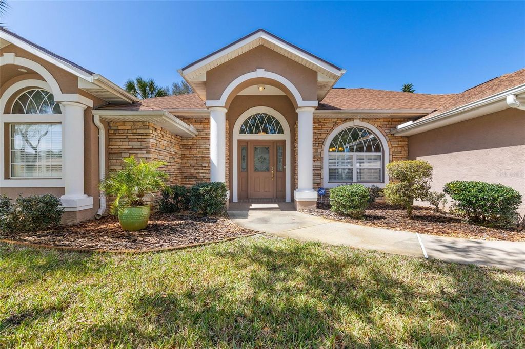 Photo of 34 Lagare Street, Palm Coast, FL 32137 (MLS # FC316668)