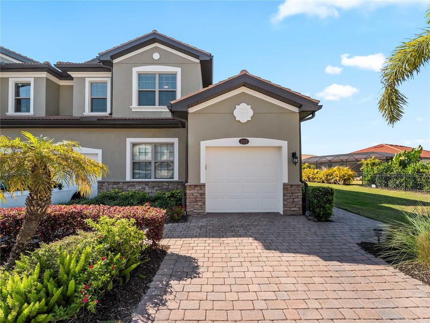 Welcome to the Carriage Homes at Toscana Isles! This gorgeous 3-bedroom, 2-bathroom condo/carriage home, complete with a separate den/office, is a true gem nestled in this active gated community. Enjoy gorgeous sunset views of the sparkling lake from your screened-in lanai, perfect for sipping your morning coffee or unwinding after a long day. The kitchen is wide open to the lake view, patio, and living room, making it an entertainer's dream for hosting friends and family gatherings. As the last building on the street, this unit enjoys the largest side yard on the street, providing additional room for outdoor activities. With only one owner, this home has been lovingly maintained and features stylish custom window treatments and upgraded lighting throughout. The freshly painted interior gives you the freedom to move right in and start enjoying paradise! Toscana Isles isn't just a place to live, it’s a lifestyle! Enjoy resort-style amenities, including a stunning clubhouse, fitness center, and sparkling infinity pool. Plus, with winding sidewalks and social events, there’s always something fun happening in this friendly neighborhood. Don’t miss out on this incredible opportunity to call this beautiful carriage-style condo your new home. Schedule a showing today and experience the charm of Toscana Isles for yourself!