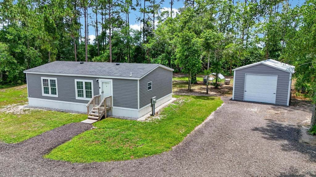 Photo of Bunnell, FL 32110 (MLS # FC319157)