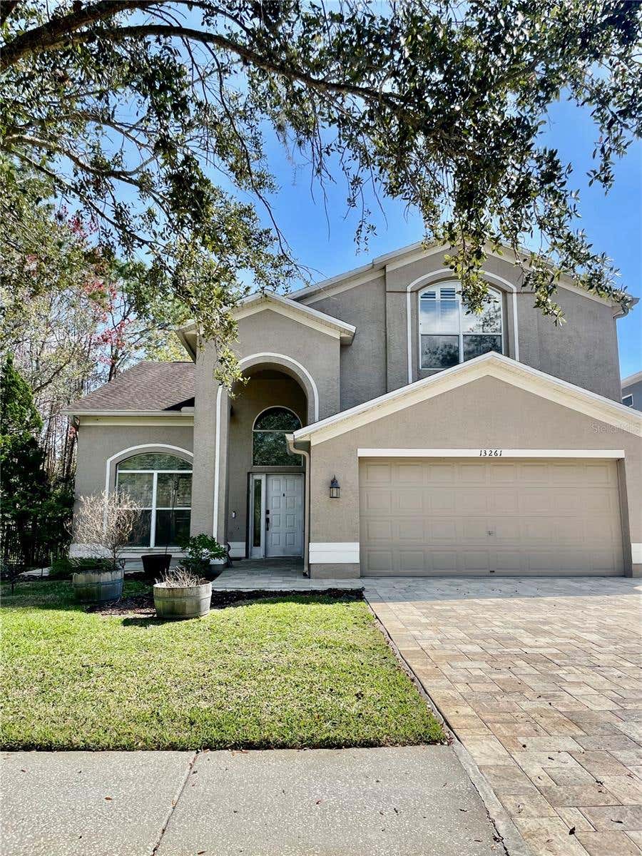 Photo of 13261 Royal George Avenue, Odessa, FL 33556 (MLS # TB8532854)