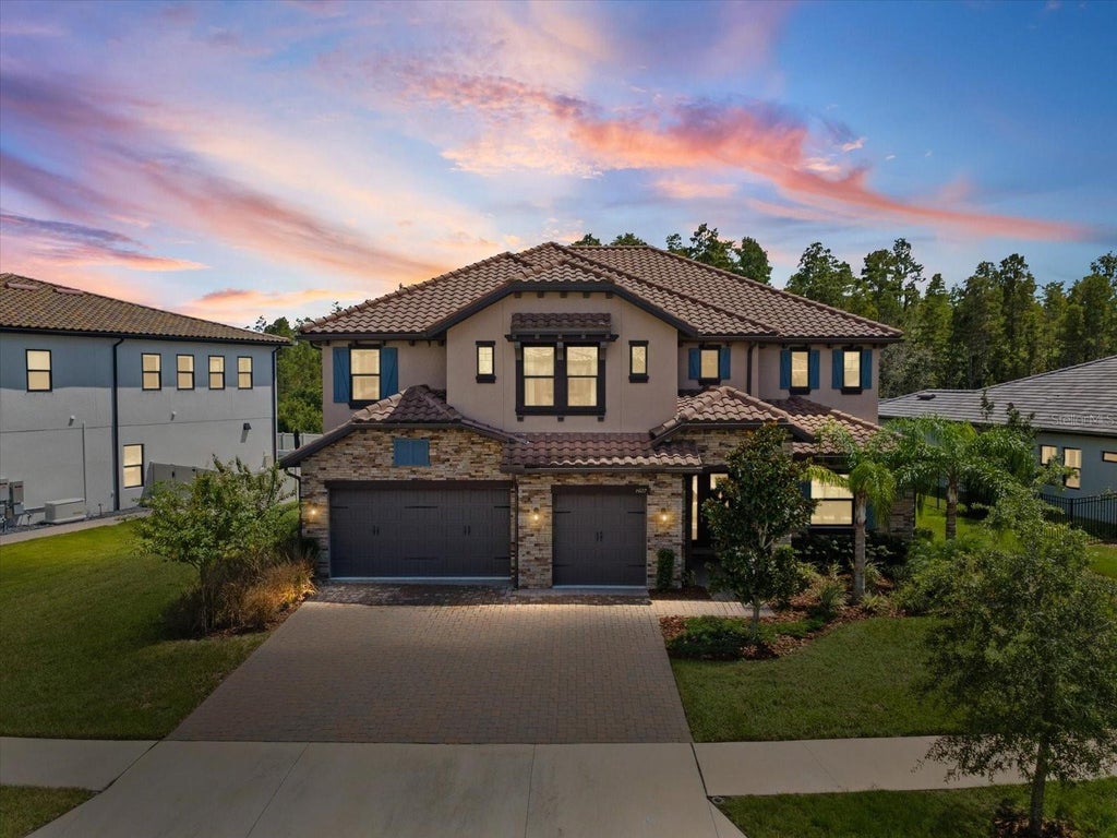 Photo of 6022 Marsh Trail Drive, Odessa, FL 33556 (MLS # W7889374)