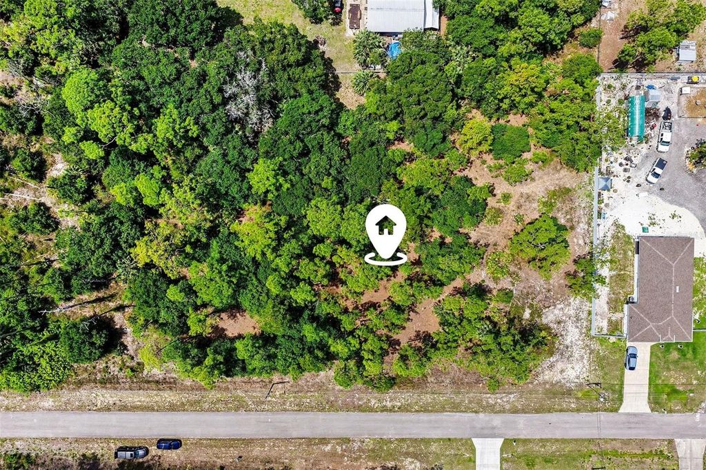 Photo of 711 Wellington Avenue, Lehigh Acres, FL 33972 (MLS # V4948530)