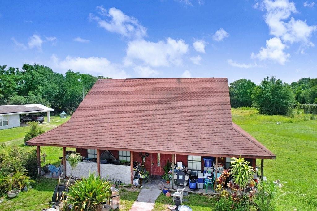 Built in 1993 and full of potential, this charming home offers 1,817 SF of living space and is situated on more than 4 ACRES of partially cleared land in a quiet area of Hardee County. Featuring 3 bedrooms and 2.5 bathrooms, the home boasts a distinctive and appealing architectural design that adds to its charm and character. It's ready for someone to bring it back to life with a little TLC, whether you're looking to renovate it into your dream home or secure a solid investment opportunity. The spacious acreage provides plenty of room for gardens, outdoor projects, or simply enjoying the peace and privacy of your surroundings. Located in a great spot close to downtown Wauchula, you'll have convenient access to shops, dining, and local amenities while still feeling tucked away from the bustle. Buyers and investors' don't miss the chance to see the possibilities here. Book your showing today!