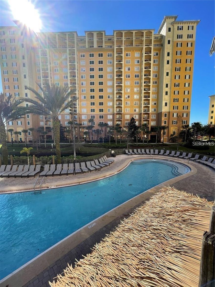 Experience resort living at its finest in one of the most sought-after locations within the resort — Building 3, perfectly positioned beside the spectacular Grand Pool, and Water Park. LOCATION, LOCATION, LOCATION! This beautifully situated fully furnished 2-bedroom condo features an extra-large private balcony, and is currently self-managed, offering excellent flexibility for personal use, or investment potential.
The spacious unit has open plan living, granite countertops in kitchen, and all bathrooms, includes 3 TVs, a luxury primary suite, with its own Jacuzzi, huge walk-in closets.  This bright inviting layout is designed for comfort, and relaxation.



Resort amenities are second to none and include a water park, two heated pools maintained at a comfortable 83 degrees, four Jacuzzis, on-site fitness center, luxury spa, games room, Pizza Hut Express, Frankie Farrell’s Pub, and Lani’s Tiki Bar.
Ideally located in the heart of Lake Buena Vista, just minutes from Orlando Premium Outlets and adjacent to Lake Buena Vista Factory Stores. On-site shuttle service to Walt Disney World, Universal Studios, and SeaWorld makes this an exceptional destination for owners and guests alike.



Perfect as a second home, vacation retreat, or income-producing investment property. A must-see opportunity!
