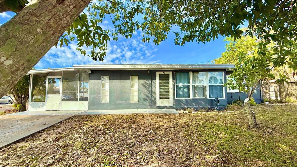 Photo of 72 Lake Shore Drive, Palm Harbor, FL 34684 (MLS # W7885318)