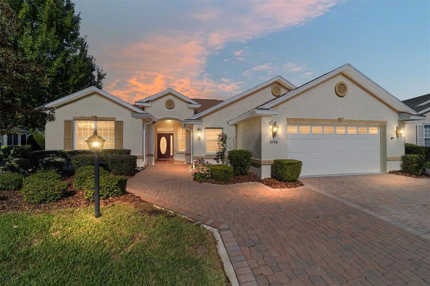 ROOF 2025 | A/C 2015
Want to live the true Florida lifestyle? Step inside this beautiful AYRESHIRE II model featuring a HUGE Florida Room with a mini-split A/C unit, perfect for year-round enjoyment. This home offers a split floor plan, new laminate flooring, and new carpet in the bedrooms. The spacious kitchen includes stainless steel appliances, while a bonus room with built-in cabinetry adjoins the primary suite—ideal for a home office, hobby space, or private sitting area.

Enjoy the cozy decorative fireplace in the great room, indoor laundry, and both a breakfast nook and formal dining area for easy entertaining. The exterior features mature landscaping, concrete curbing, and an open paver patio, plus a paver driveway and walkway that add to the home’s curb appeal.

There’s so much to love—come see it for yourself and start living the Florida dream!