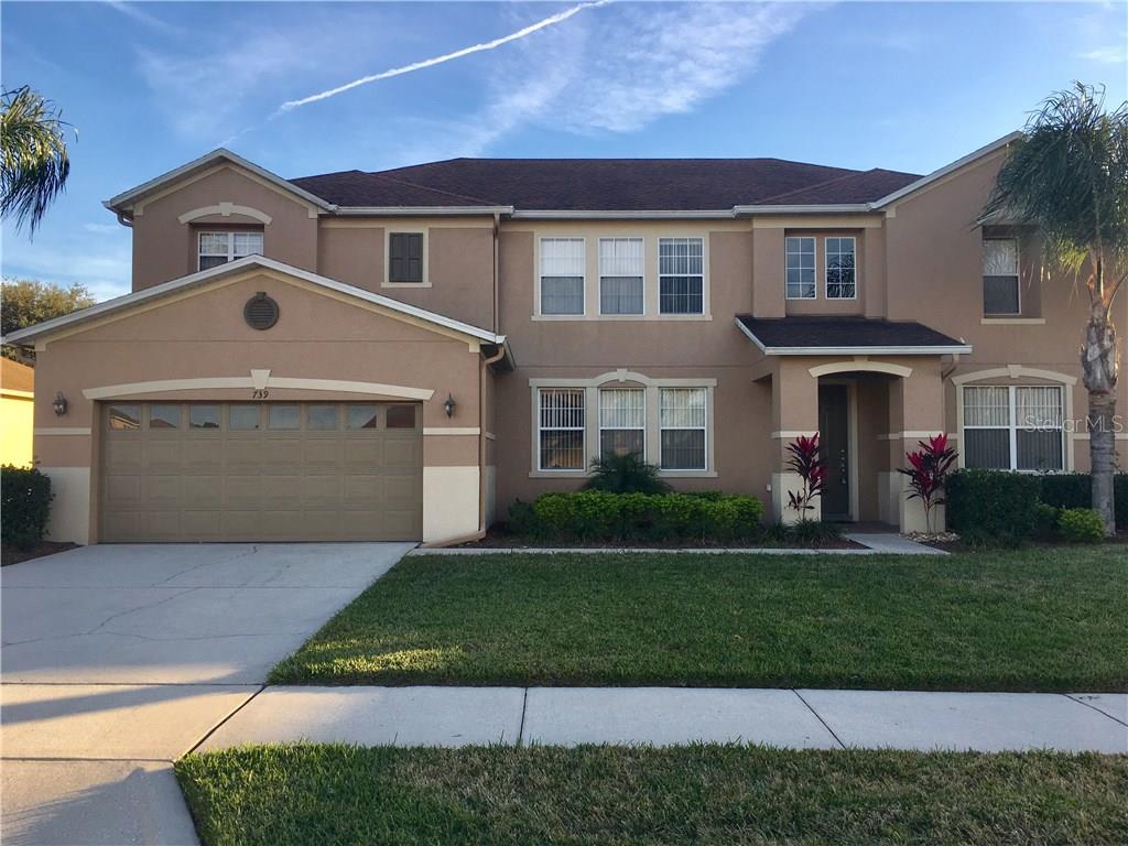 AVAILABLE NOW...Fantastic, gated community with pool, playground, sports field, and community boat ramp/dock. This beautiful home is immaculate and offers 5 bedrooms and 3 full baths. The kitchen is nestled in the back, with an expansive breakfast bar overlooking the family room & boasts features such as 42" cabinets, all appliances. Sliding doors lead to the back yard. The master bedroom is a retreat of its own and the suite offers enormous space, two large walk-in closets, and a stunning master bath. You'll enjoy a garden tub, separate walk-in shower, and double vanity sink. Bring your boat & relax on your community waterfront complex! Close to Fowler’s Grove Village, shopping, restaurants, Hwy 50, 429, FL Turnpike and the 408. Very Easy to show. Schedule your private showing today.