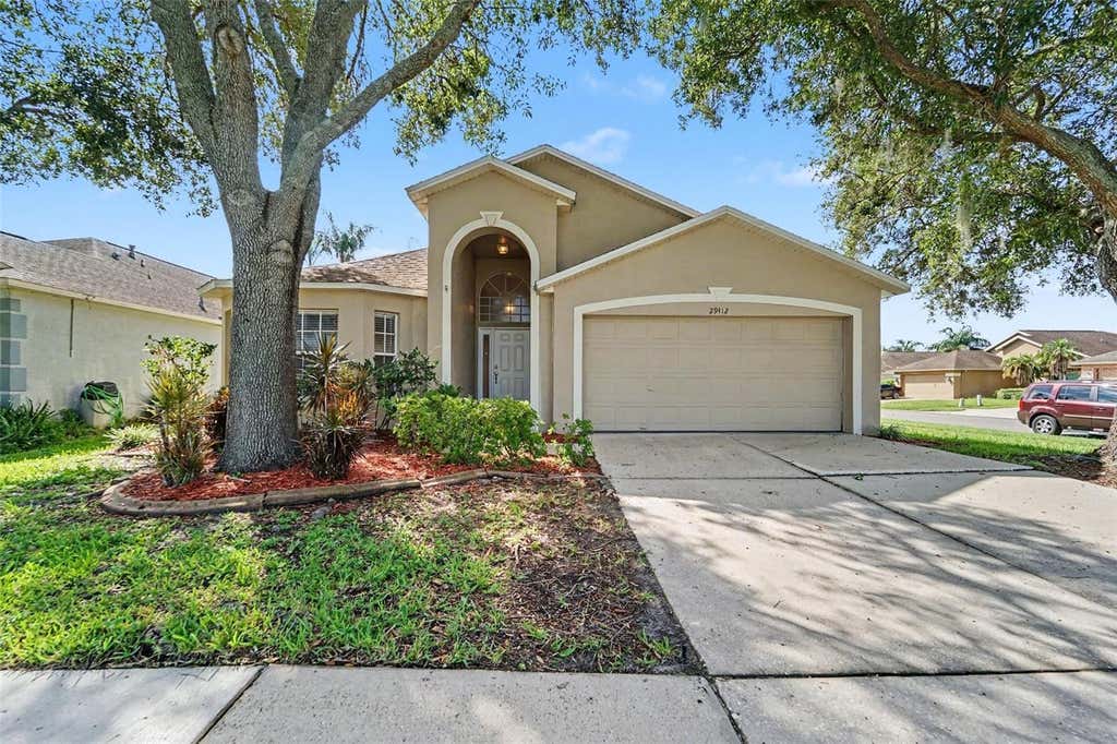 Photo of 29412 Sea Dahlia Pass, Wesley Chapel, FL 33543 (MLS # O6435137)