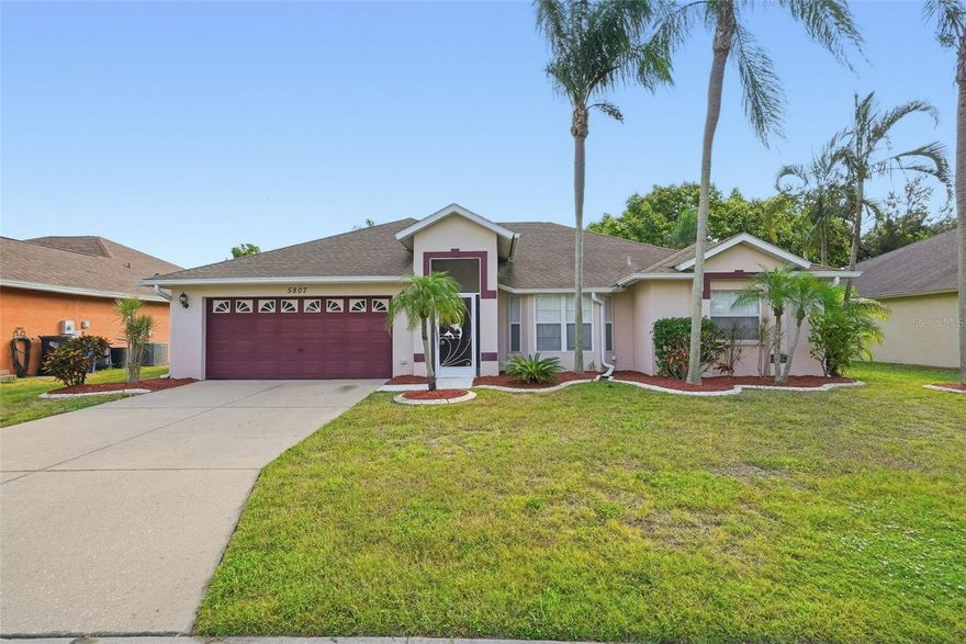 One or more photo(s) has been virtually staged. Spacious one-story home featuring 4 bedrooms and 2 bathrooms with a bright open floor plan. The kitchen offers a convenient bar and flows seamlessly into the living spaces, highlighted by a beautiful bay window and separate dining room. The primary suite boasts double vanities, a separate tub and shower, and plenty of room to relax. Enjoy outdoor living on the enclosed lanai or back porch overlooking the fenced backyard. A 2-car garage provides parking and storage. Schedule a showing today!