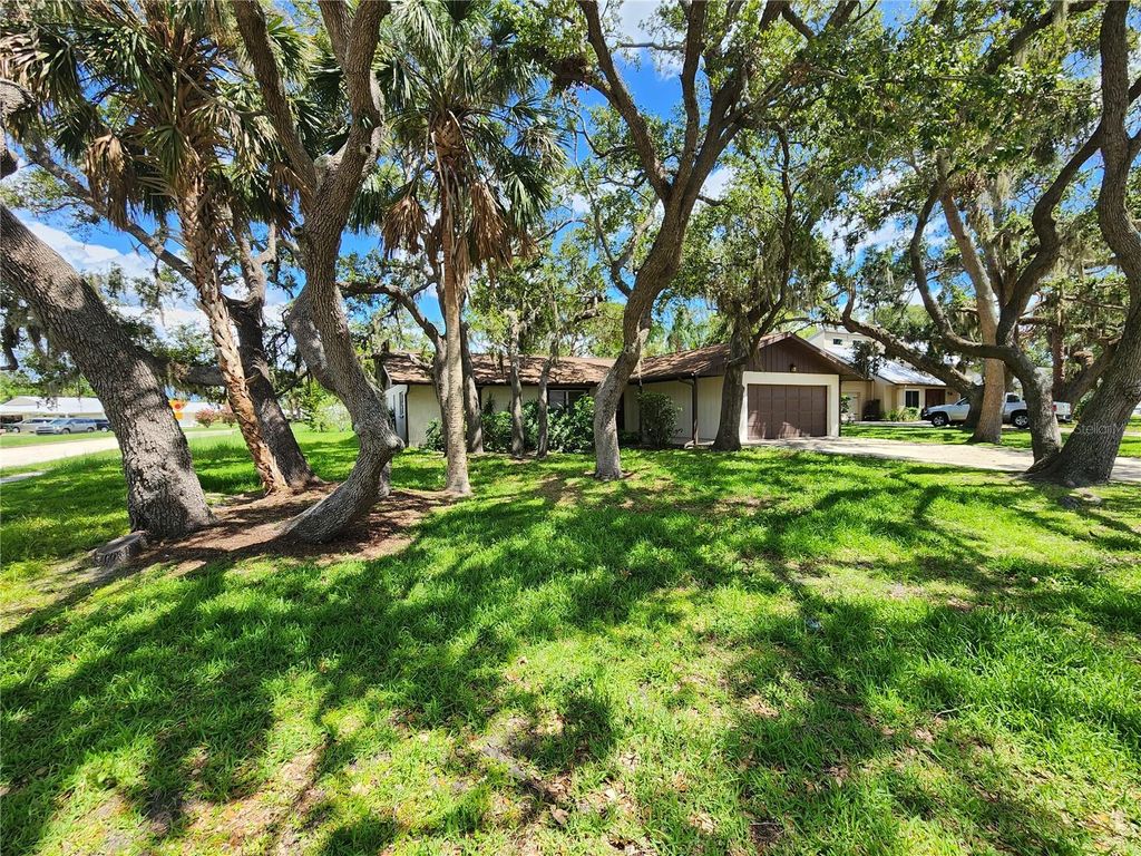 Photo of 5629 Boulder Boulevard, Sarasota, FL 34233 (MLS # A4657089)