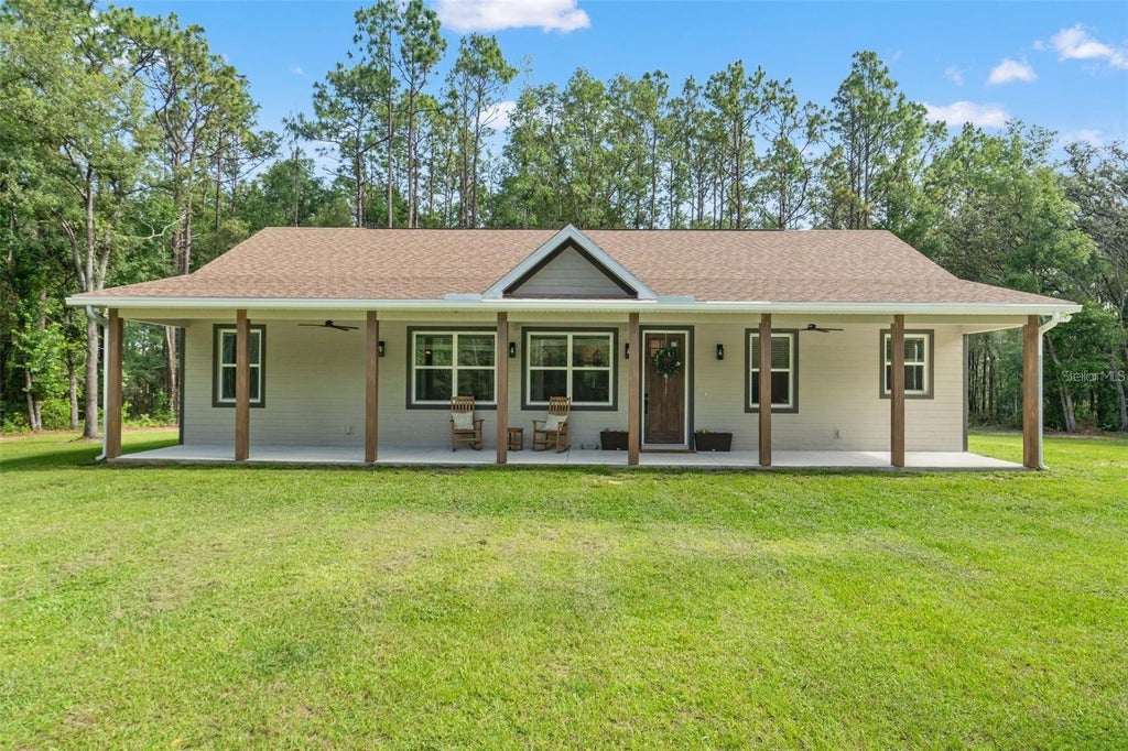 Photo of 27295 Tarbel Road, Brooksville, FL 34602 (MLS # J1000747)