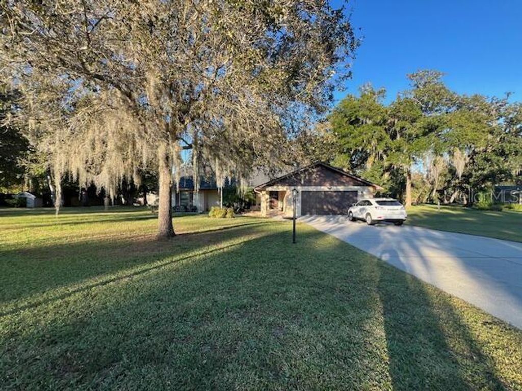 Photo of 5141 Magnolia Ridge Road, Fruitland Park, FL 34731 (MLS # O6378604)