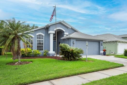 This immaculate home shows wonderfully and sits on one of the prettiest lots in the neighborhood. Enjoy your coffee sitting on your porch over looking scenic views of a POND, DEER and WOODS. Home sits on quiet cul-de sac so little trafic. Once inside the living room is spacious and designed for comfort and entertaining with very open floor plan. Primary bath has been totallly remodeled and will remind you of a spa. Most appliances have been recently replaced. For a low rate of $218.00 you enjoy low-maintance living encluding lawn with reclamed water, trash/recyling, security gate, and common areas. Location is anther plus being close to hospitals, shopping abd beaches. Bring your golf cart and experience Florida living at it best.