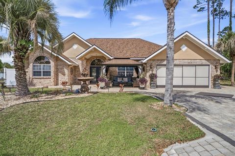 Photo of 11 Bannerwood Lane, Palm Coast, FL 32137 (MLS # FC317223)